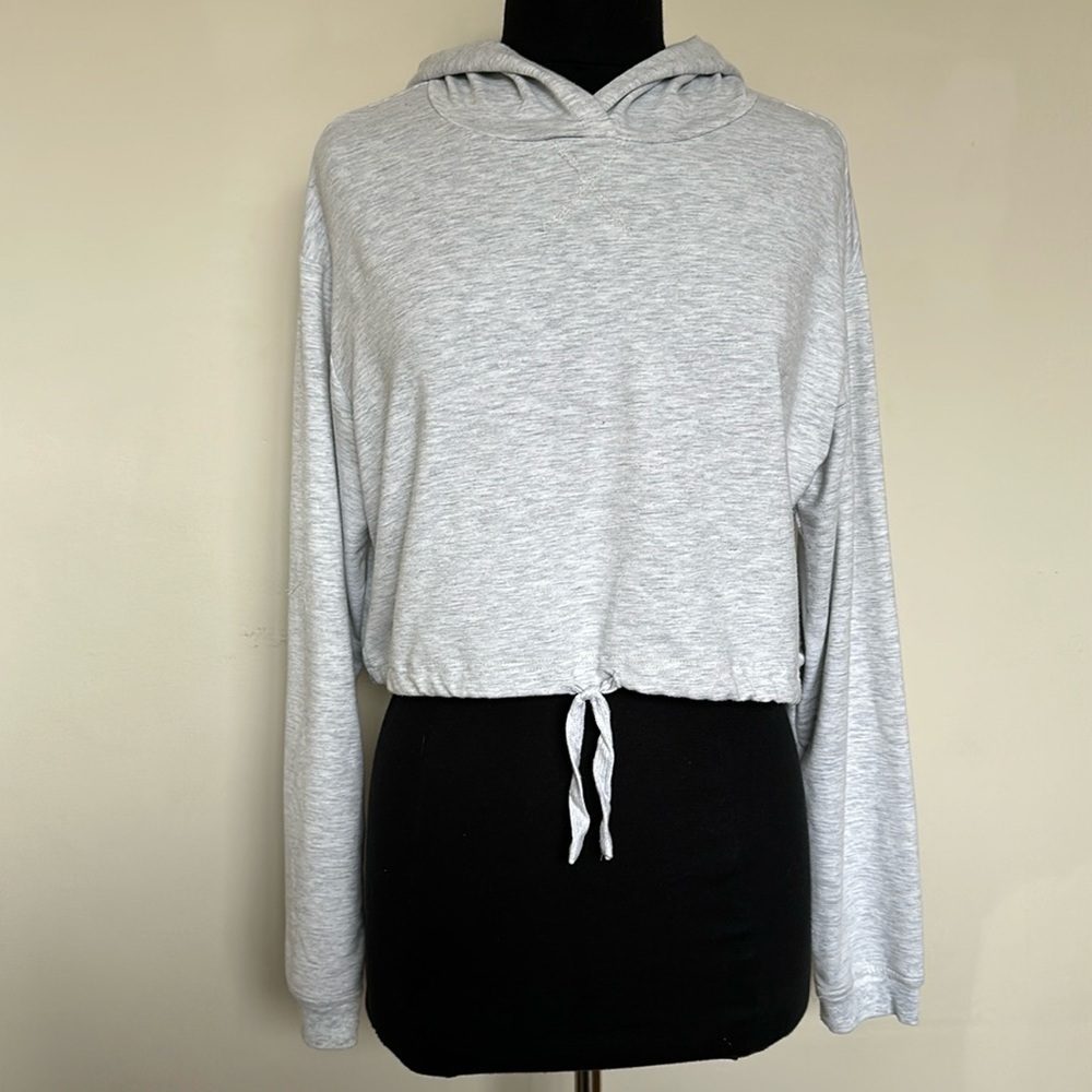 Garage gray pullover, cropped hoodie, Sz M 49%, polyester, 48% rayon 4% spandex